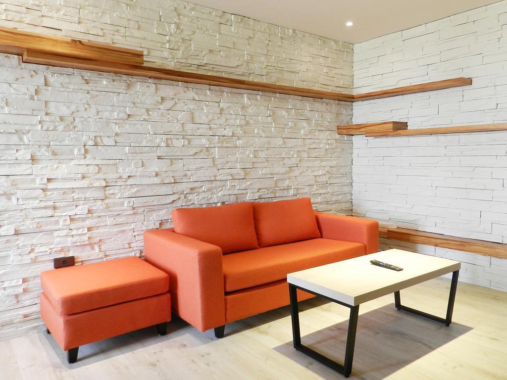 Look Royal Resort Цзяи Экстерьер фото A modern sofa