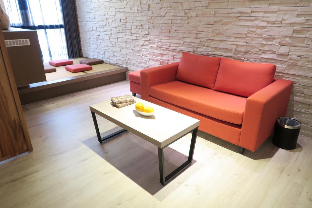 Look Royal Resort Цзяи Экстерьер фото A sofa
